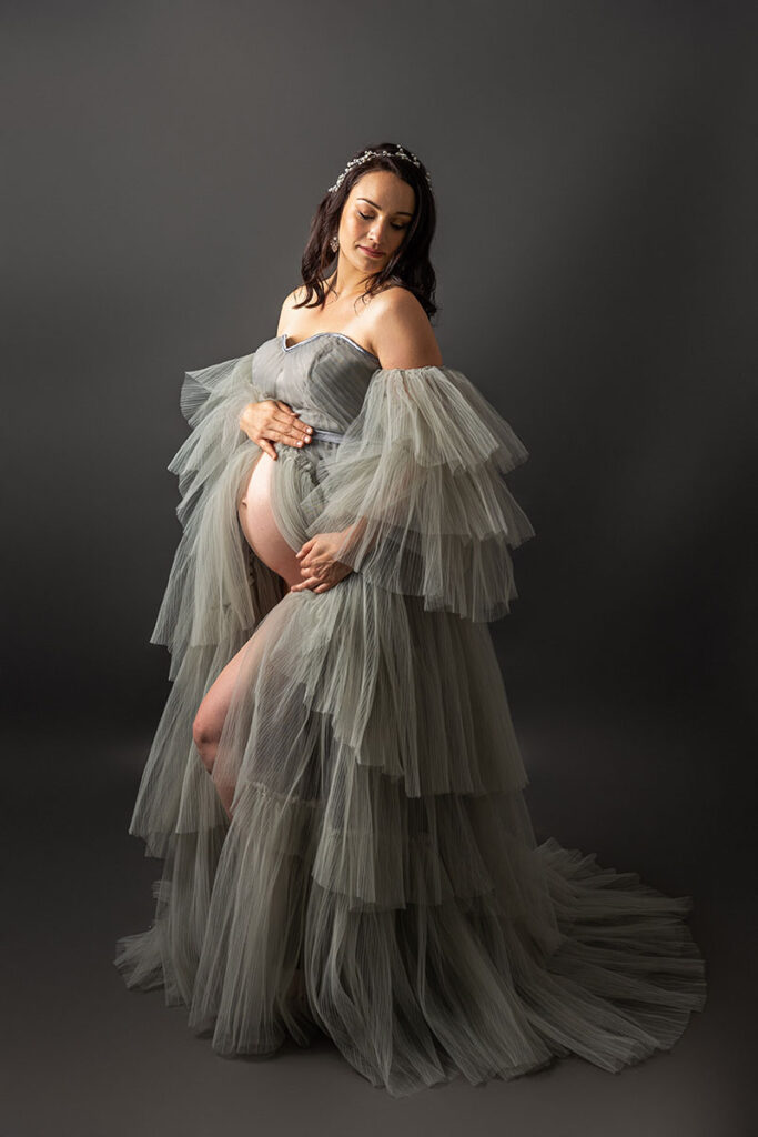 Pregnant woman with grey gown